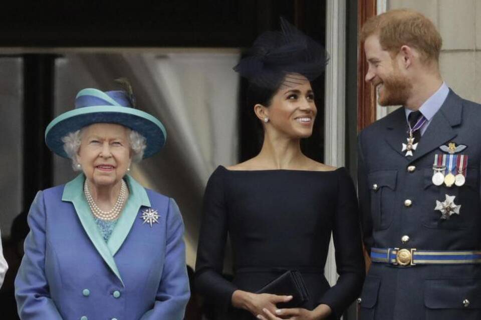 Königin Elizabeth II., Meghan und Prinz Harry Königin Elizabeth II., Meghan und Prinz Harry