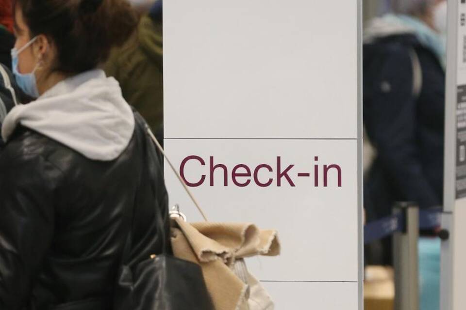 Am Check-in-Schalter Am Check-in-Schalter