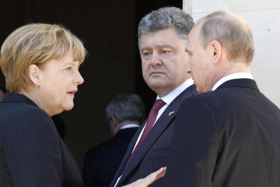 Merkel, Poroschenko, Putin