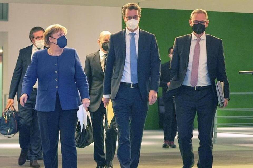 Merkel, Wüst, Müller