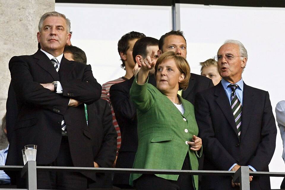 Merkel und Beckenbauer