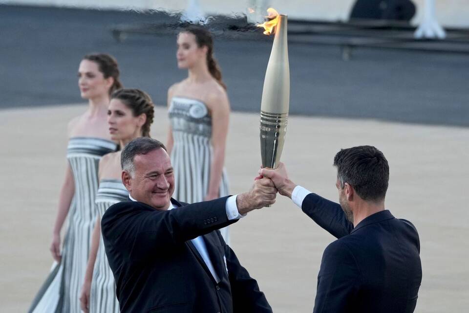 Übergabe des olympischen Feuers Übergabe des olympischen Feuers