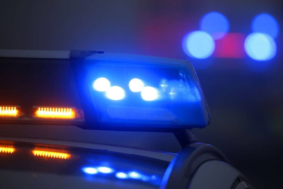 Polizeiauto mit Blaulicht Polizeiauto mit Blaulicht