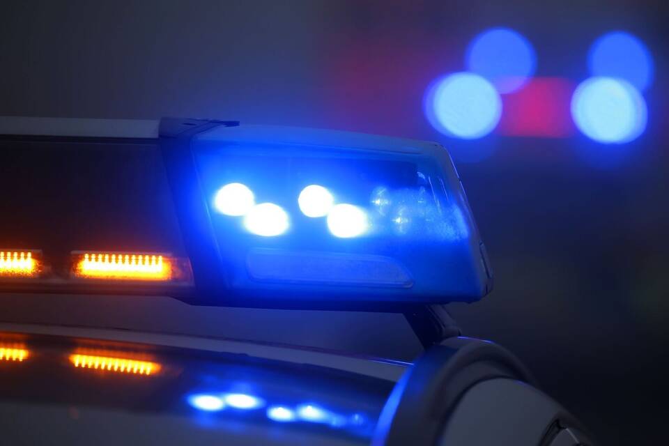Polizeiauto mit Blauchlicht Polizeiauto mit Blauchlicht