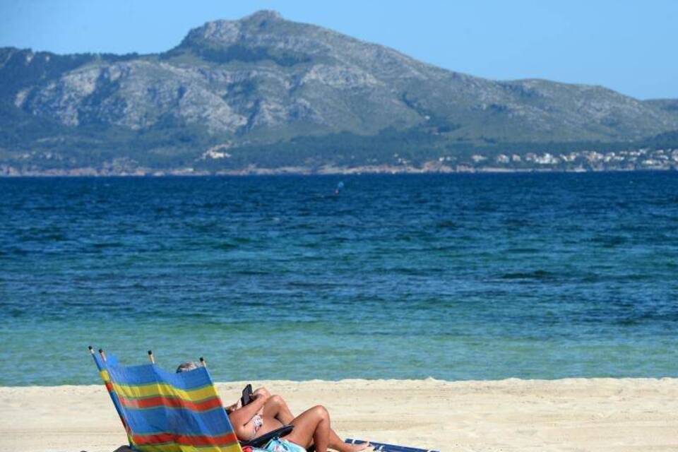 Urlauber am Strand