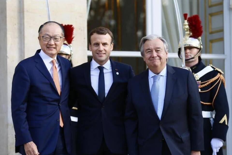 Kim, Macron und Guterres in Paris