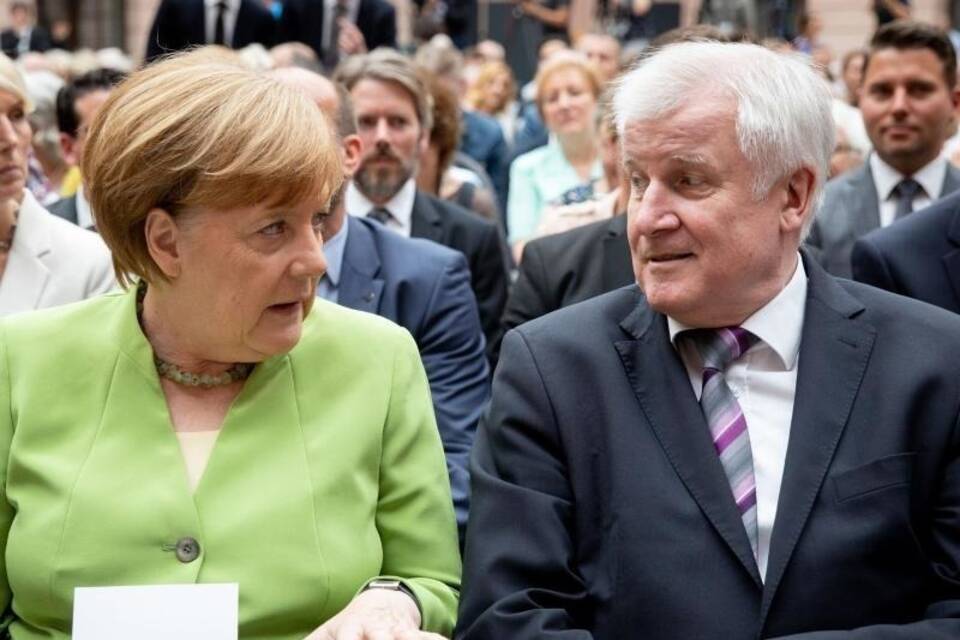 Seehofer und Merkel