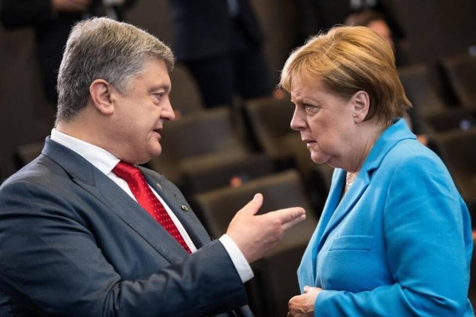 Petro Poroschenko und Angela Merkel