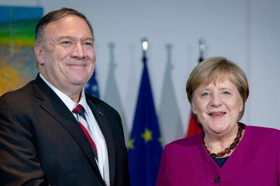 Mike Pompeo und Angela Merkel